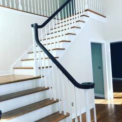 After residential interior painting of stairs and spindles by Pro Finish Painting and Drywall from Chagrin Falls, Ohio
